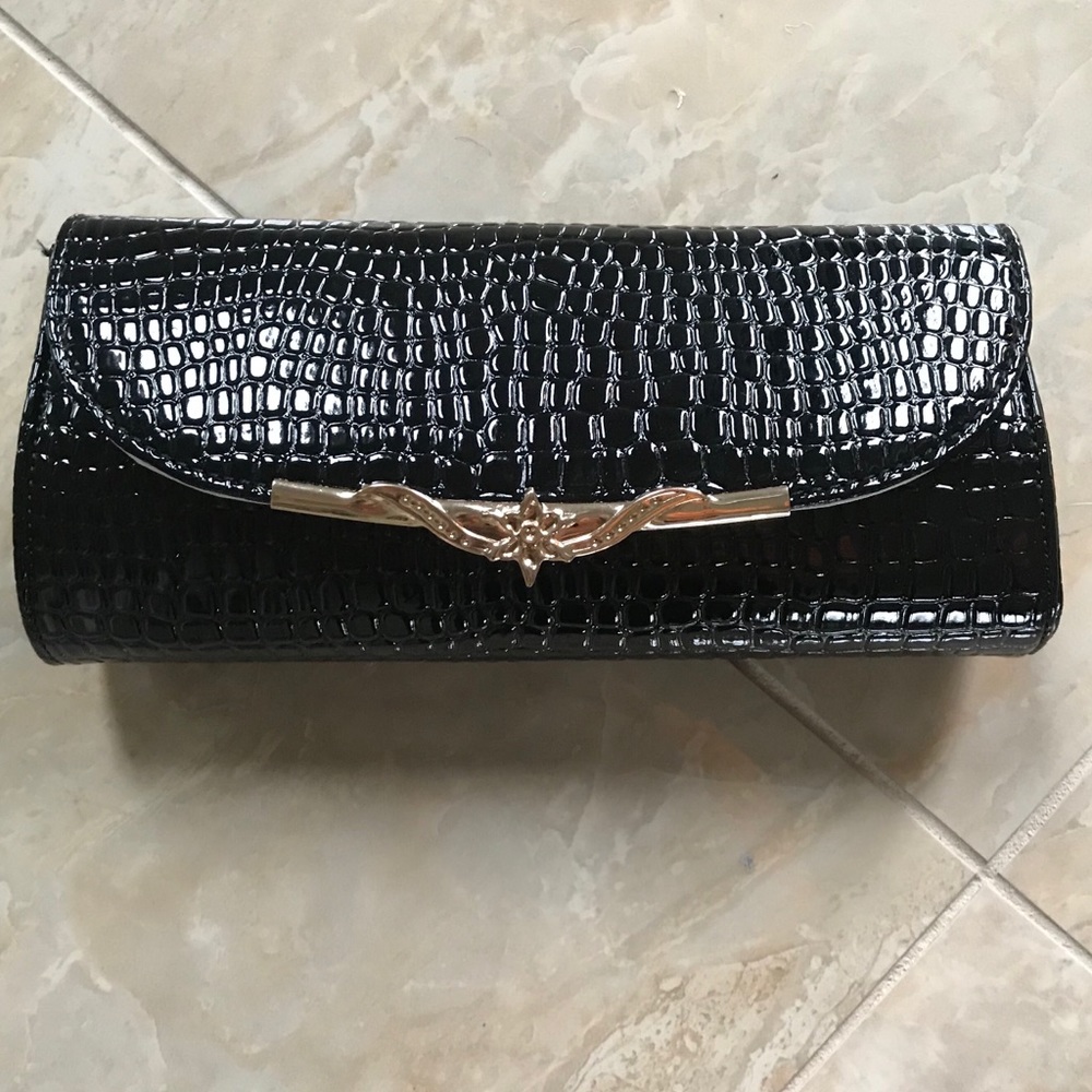 NWOT Black and Gold Clutch